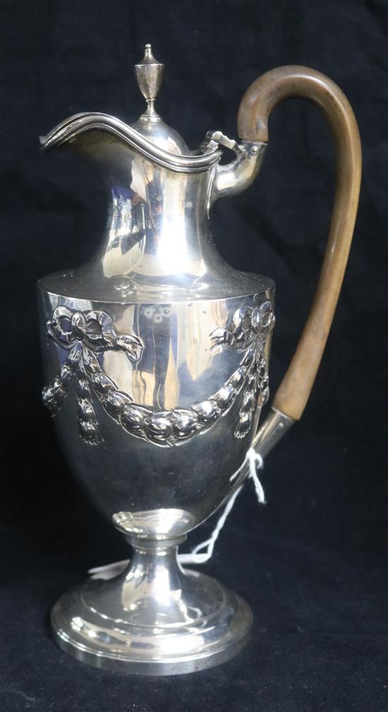 A late Victorian silver hotwater pot by Charles Stuart Harris, London, 1897, gross 14.5 oz.